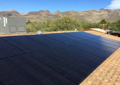 All black Solar panels on shingle roof in Tucson